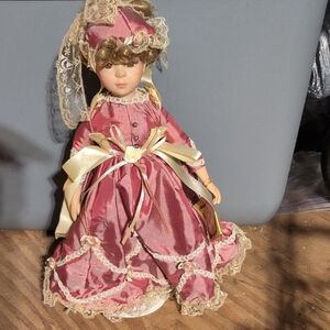 Vintage Pink Porcelain Doll with Lace Details
